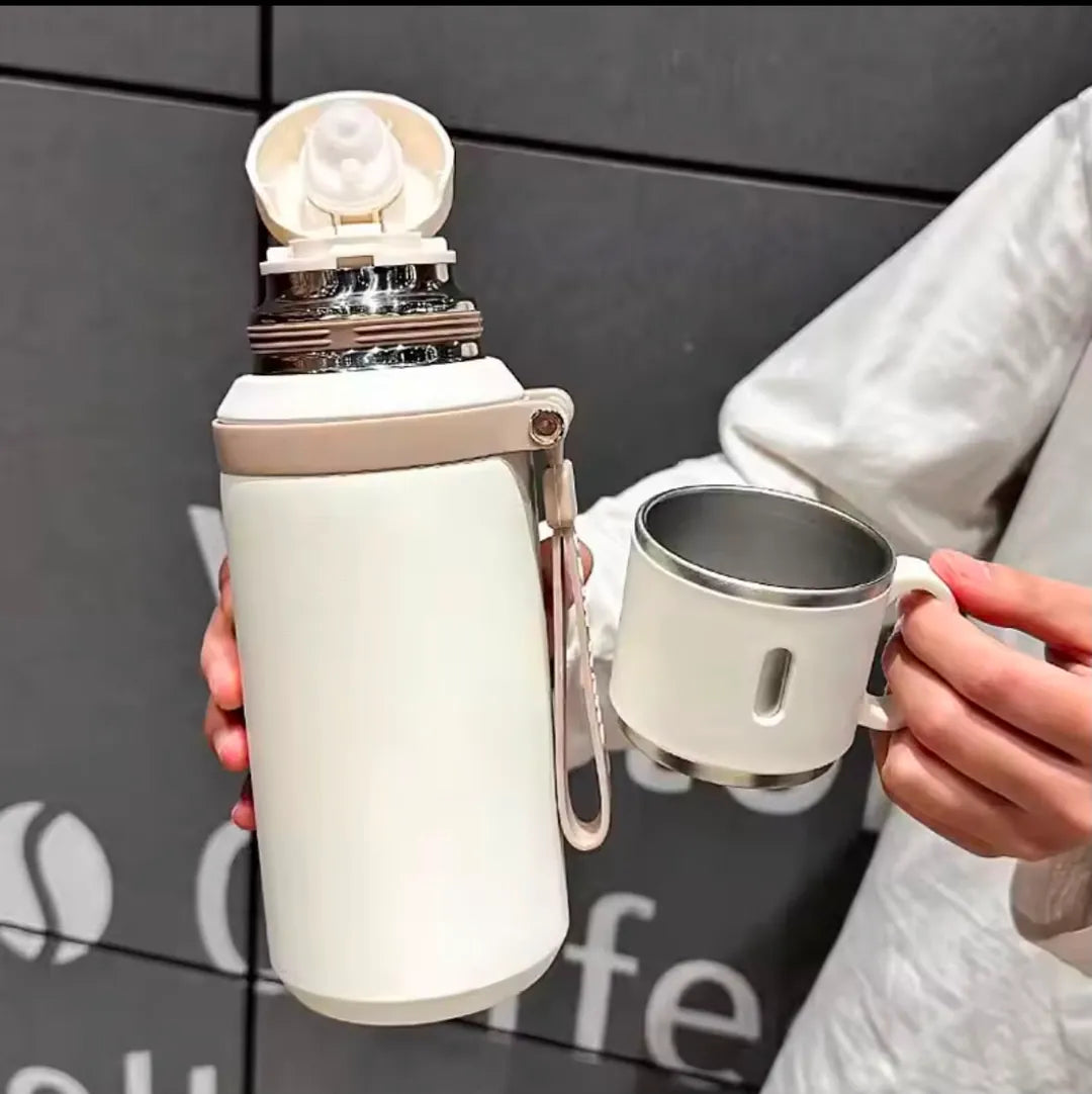 Termo térmico con taza incorporada